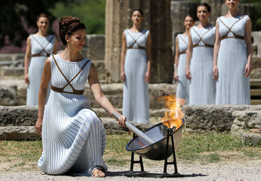 Over the next few weeks, the Olympic torch will make its way from Greece to the host nation Brazil, before lighting the cauldron in the Olympic Stadium in Rio de Janerio. We take a look at its progress so far.

(Pictured) Greek actress Katerina Lehou, playing the role of High Priestess, lights the flame from the sun's rays reflected in a parabolic mirror during the Olympic flame lighting ceremony for the Rio 2016 Olympic Games at the site of ancient Olympia in Greece on April 21, 2016.