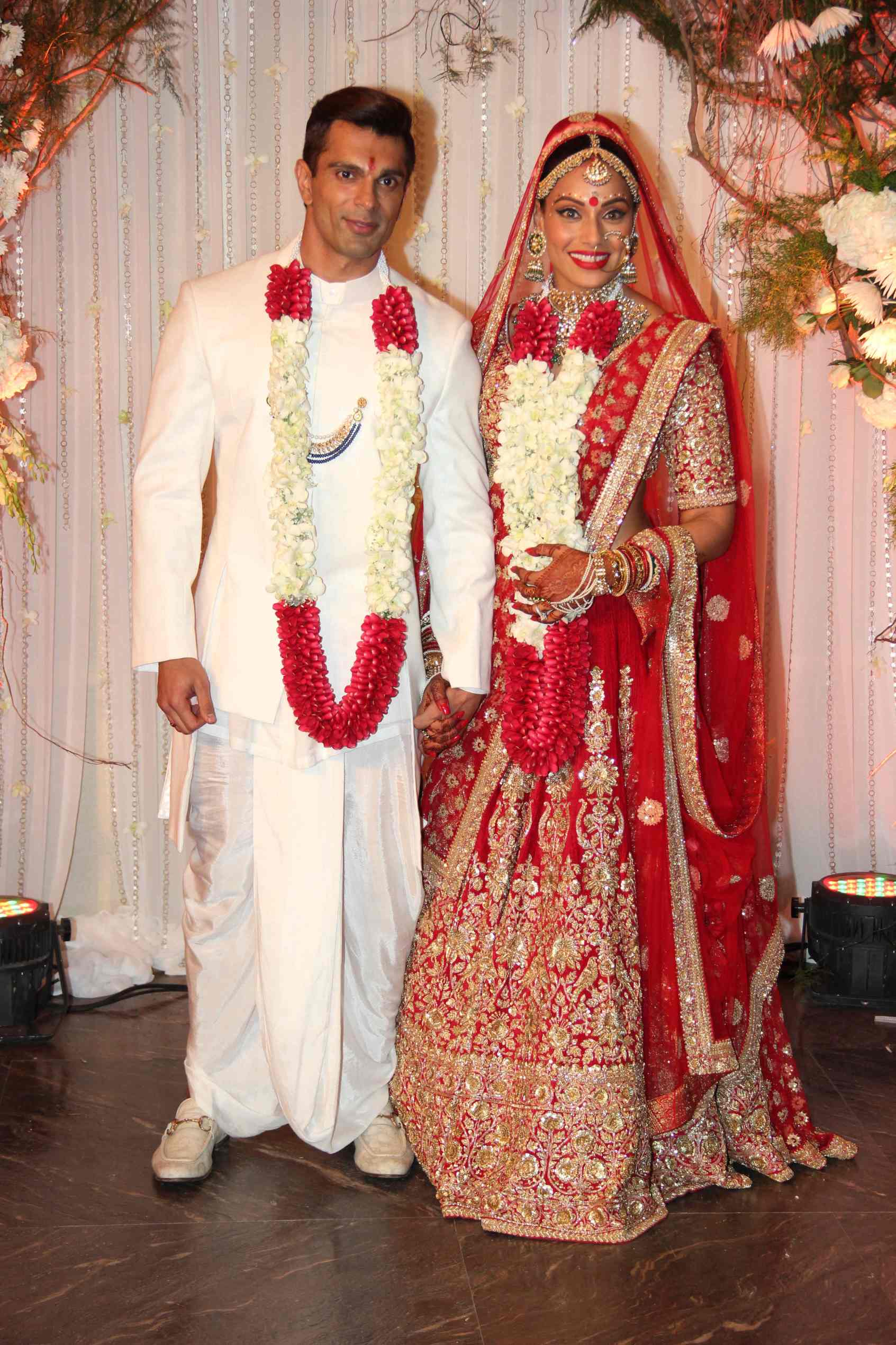 bride stands left side groom