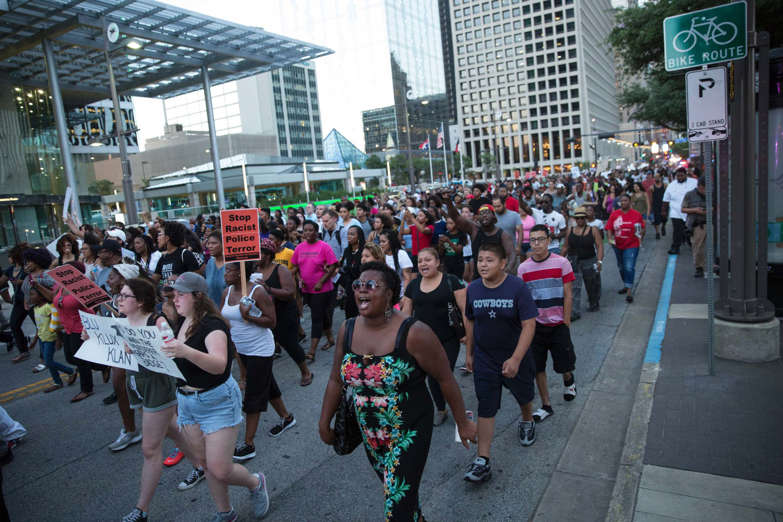 People rally in Dallas, Texas, on Thursday, July 7, 2016 to protest the deaths of Alton Sterling and Philando Castile.
Black motorist Philando Castile, 32, a school cafeteria worker, was shot at close range by a Minnesota cop and seen bleeding to death i