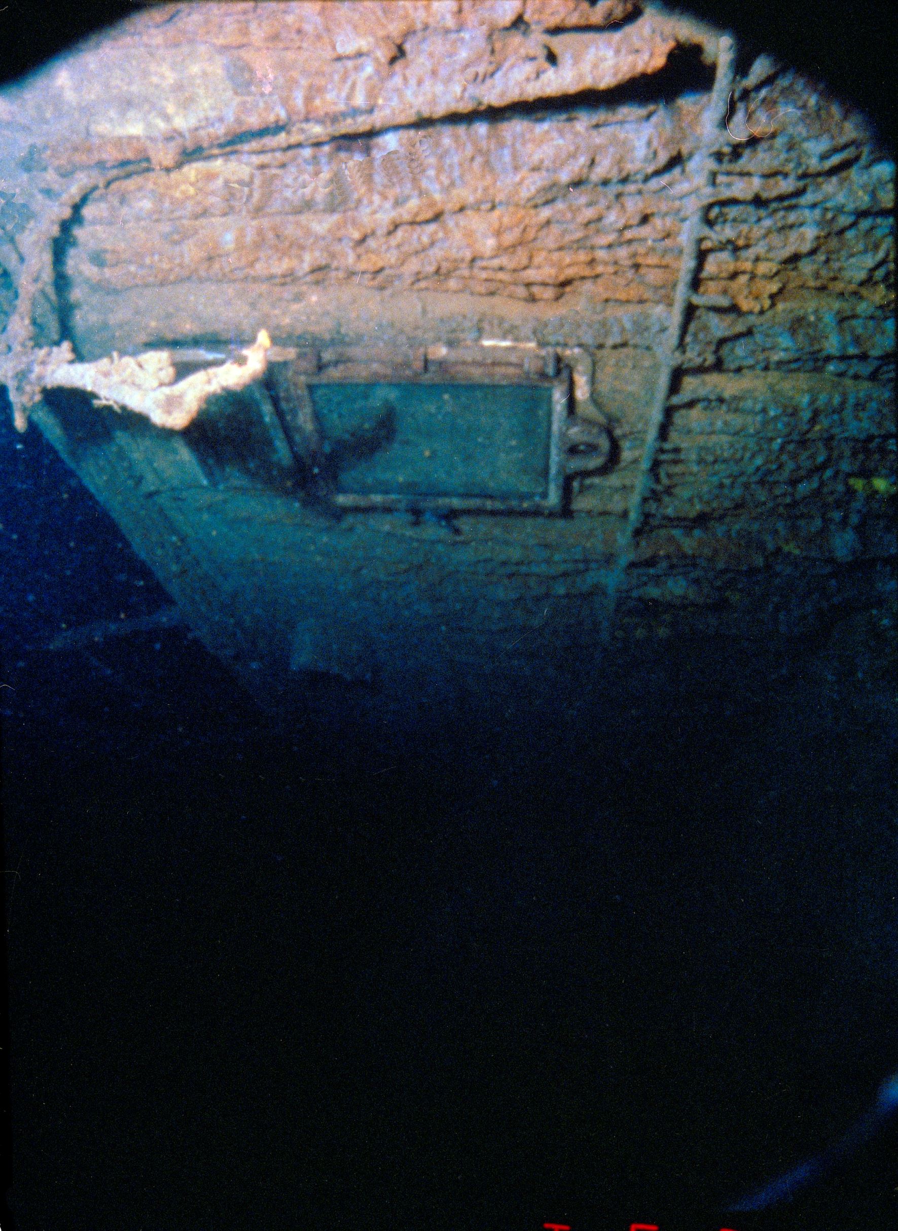 An officer's cabin window on the Titanic's boat deck starboard side is shown in this photo released in Washington Wednesday, July 30, 1986. Alvin, a three-person manned sumersible surveyed the wreckage of the supposedly unsinkable line, giving the world 