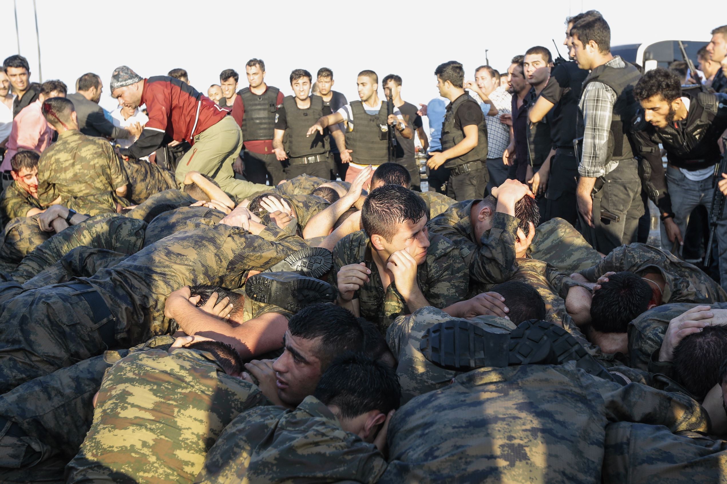 ISTANBUL, TURKEY - JULY 16: Soliders involved in the coup attempt surrender on Bosphorus bridge on July 16, 2016 in Instabul,  Turkey. Istanbul's bridges across the Bosphorus, the strait separating the European and Asian sides of the city, have been clos