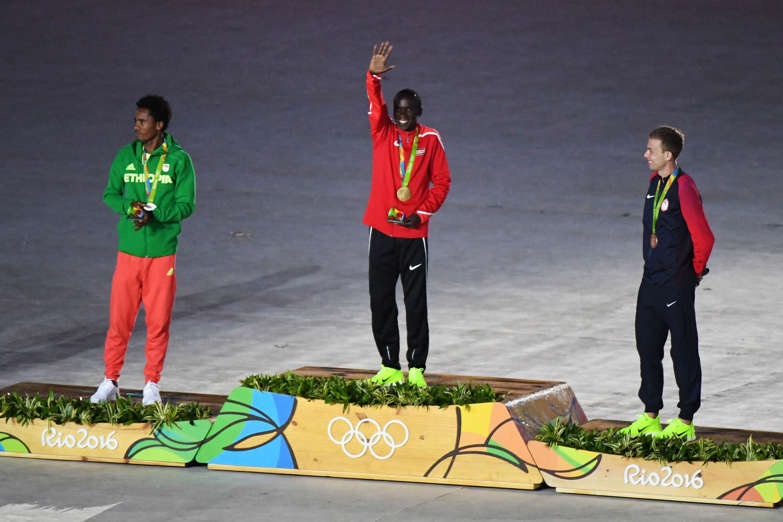 Olympic marathon medalists Feyisa Lilesa (ETH), Eliud Kipchoge (KEN), and Galen Rupp (USA)