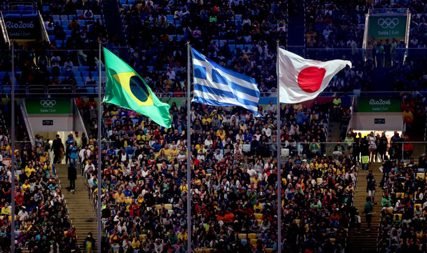 The Brazilian flag, Greek flag and the Japanese flag fly during the closing ceremonies for the Rio 2016 Summer Olympic Games at Maracana. The 2020 Summer Olympic games will be held in Tokyo, Japan.