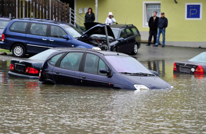 PASSAU, GERMANY - JUNE 03: Parked cars are flooded by the rising Danube river in the historic city center on June 3, 2013 in Passau, Germany. Heavy rains are pounding southern and eastern Germany, causing wide-spread flooding and ruining crops. At least 