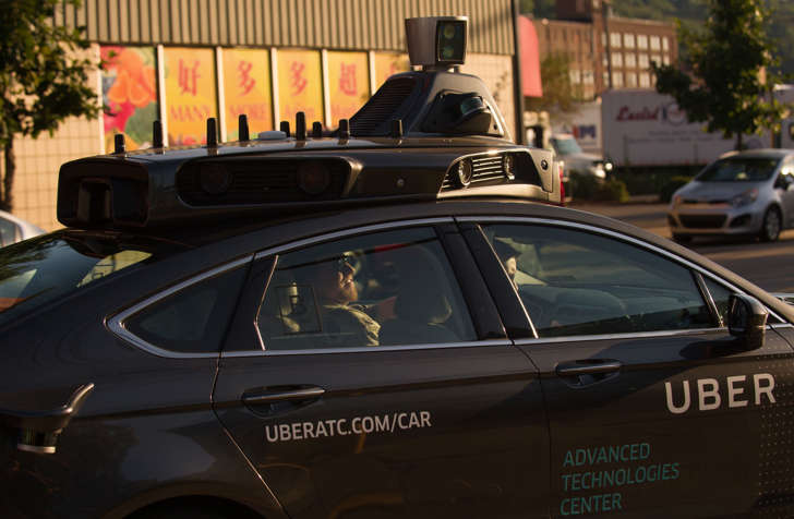 An Uber driverless Ford Fusion drives down Smallman Street on September, 22, 2016 in Pittsburgh, Pennsylvania.