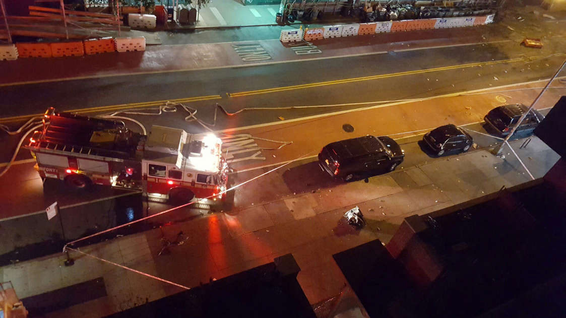 Fire rescue crews block off the street near the scene of an explosion in the Chelsea neighbourhood of New York, U.S. in this September 17, 2016 handout photo obtained via Twitter.