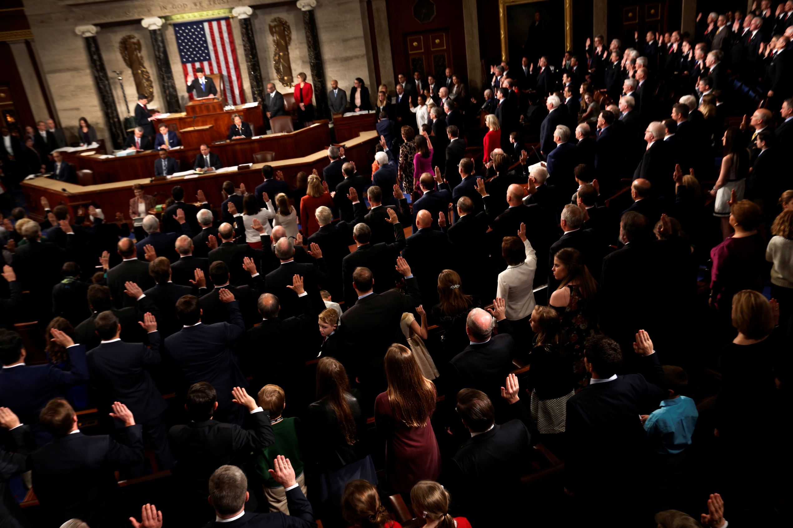 Members of the US House of Representatives are sworn in on the House floor on the first day of the new session of Congress at the Capitol in Washington, DC, on January 3, 2017.