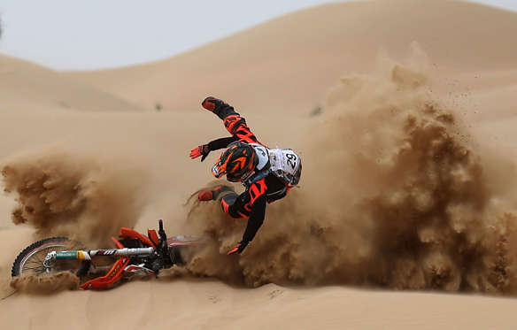 Slide 3 of 34: DUBAI, UNITED ARAB EMIRATES - MARCH 11:  Mohammed Anis of India crashes into the sand during day two of the Dubai International Bajaon March 11, 2017 in Dubai, United Arab Emirates.  (Photo by Francois Nel/Getty Images)