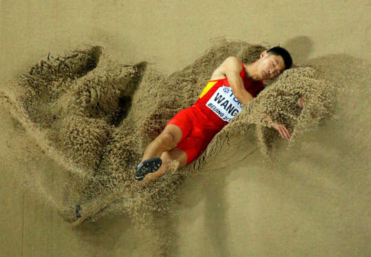 Slide 31 of 34: Wang Jianan of China competes in the men's long jump final during the 15th IAAF World Championships at the National Stadium in Beijing, China, August 25, 2015. REUTERS/Fabrizio Bensch TPX IMAGES OF THE