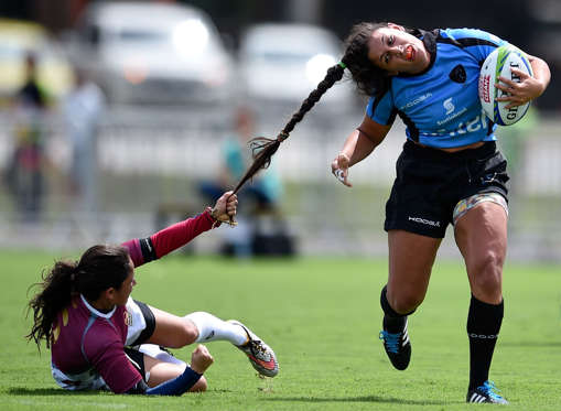 Slide 25 of 34: RIO DE JANEIRO, BRAZIL - MARCH 05: Maryoly Gamez of Venezuela battles for the ball against Victoria Rios of Uruguay during the International Womens Rugby Sevens - Aquece Rio Test Event for the Rio 2016 Olympics at Deodoro Olympic Park on March 6, 2016 in