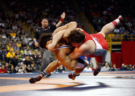 Slide 21 of 34: IOWA CITY, IOWA - APRIL 10:  Parker Betts is thrown by Jacob Mitchell during their 130kg Greco-Roman challenge match on day 2 of the 2016 U.S. Olympic Team Wrestling Trials at Carver-Hawkeye Arena on April 10, 2016 in Iowa City, Iowa.  (Photo by Jamie Sq