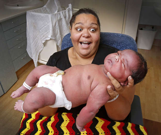 Baby Brian Liddle Jr. is held by his mom, Natashia Corrigan, during a photo shoot at Mercy Hospital, Jan. 24, 2017, in Melbourne, Australia. Brian weighed in at 13 pounds 4 ounces, almost double the normal weight for a baby.