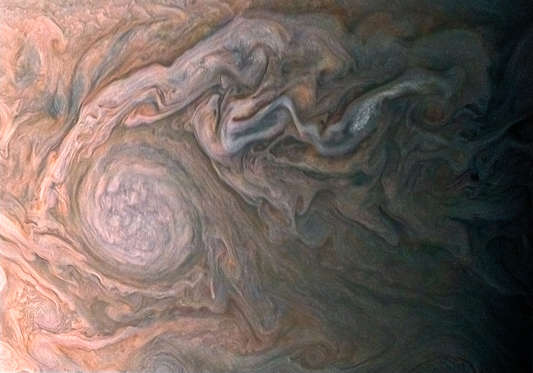 Slide 6 of 11: NASA’s Juno spacecraft skimmed the upper wisps of Jupiter’s atmosphere when JunoCam snapped this image on Feb. 2 at 5:13 a.m. PT (8:13 a.m. ET), from an altitude of about 9,000 miles (14,500 kilometers) above the giant planet’s swirling cloudtops.
