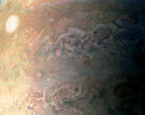 Slide 5 of 11: This amateur-processed image was taken on Dec. 11, 2016, at 9:27 a.m. PST (12:27 p.m. EST), as NASA’s Juno spacecraft performed its third close flyby of Jupiter.