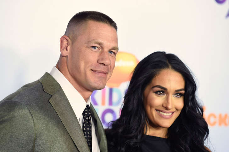 John Cena, left, and Nikki Bella arrive at the Kids' Choice Awards at the Galen Center on Saturday, March 11, 2017, in Los Angeles.