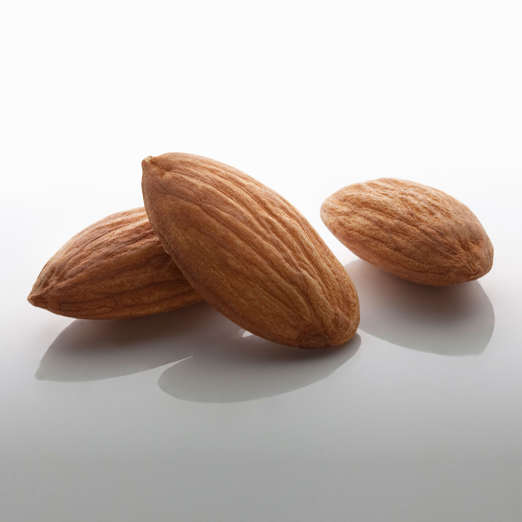 Almonds are a great source of mono- and polyunsaturated fats, which can help lower your cholesterol and keep you slim. They also contain fewer calories than most other varieties of nuts (just 163 calories for 23), as well as plenty of fiber and vitamin E. According to a study in the International Journal of Obesity, people who added a daily serving of almonds to a low-calorie diet lost more weight than those who followed the same diet but ate a carb-heavy snack such as crackers instead. <br><br>To reap the benefits, Sass recommends using almonds to crust a lean protein such as salmon or sprinkling them onto salads and cooked veggies. "You can also whip them into smoothies or use nut butter as the base for a savory sauce seasoned with garlic and ginger," she says.<br><br><b>RELATED: <a href="http://www.health.com/health/gallery/0,,20676415,00.html">The 20 Best Foods to Eat for Breakfast</a></b>