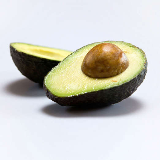 Is there anything avocados can't do? This creamy superfood (loaded with monounsaturated fats, potassium, magnesium, folate, and vitamins C and E) has been linked to improved vision, good heart health, and a reduced risk of certain cancers. And avocados can also help whittle your middle: according to one study, people who regularly consume them weigh less and have smaller waists than those who do not. Another study found that women who eat half an avocado at lunchtime might experience reduced food cravings later in the day.<br><br>There are countless ways to enjoy the fruit (yes, technically it is one), but you can't beat the classic combination of whole-wheat toast with mashed avocado, lemon juice, and sunflower seeds. Sass also recommends whipping avocado into a smoothie, pureeing it with herbs and citrus juice to make a creamy salad dressing, or adding it to a veggie omelet.<br><br><b>RELATED: <a href="http://www.health.com/health/gallery/0,,20395687,00.html">8 Avocado Recipes (Besides Guacamole)</a></b>