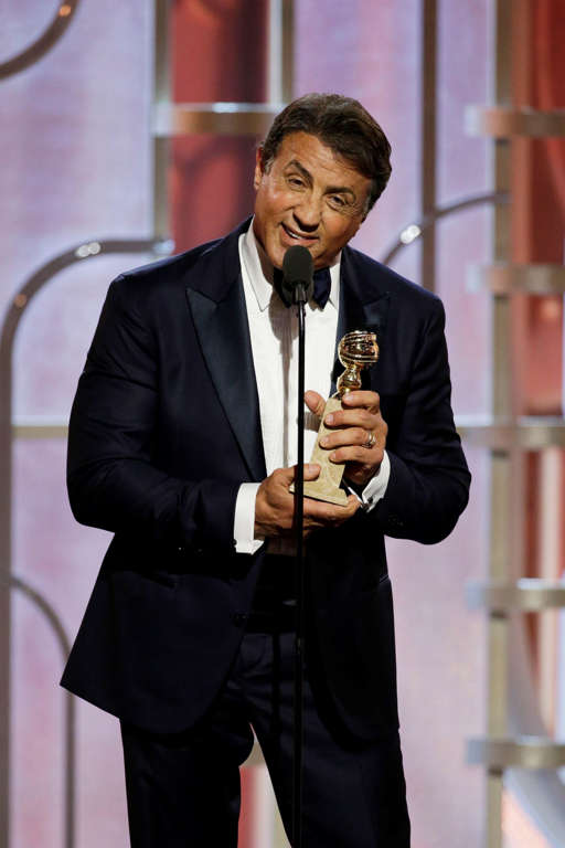 BEVERLY HILLS, CA - JANUARY 10: In this handout photo provided by NBCUniversal, Sylvester Stallone accepts the award for Best Supporting Actor - Motion Picture for  "Creed" onstage during the 73rd Annual Golden Globe Awards at The Beverly Hilton Hotel on January 10, 2016 in Beverly Hills, California.  (Photo by Paul Drinkwater/NBCUniversal via Getty Images)