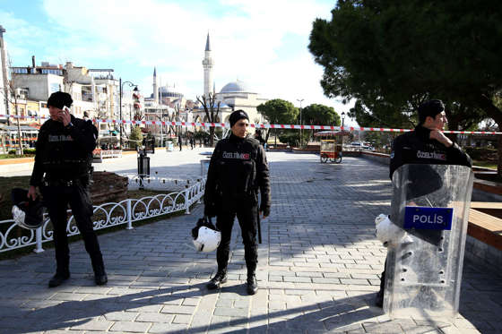 Policemen secure an area at the historic Sultanahmet district, which is popular with tourists, after an explosion in Istanbul, Tuesday, Jan. 12, 2016. The private Dogan news agency says at least two people were hospitalized following an explosion in the historic center of Istanbul. (AP Photo/Lefteris Pitarakis)