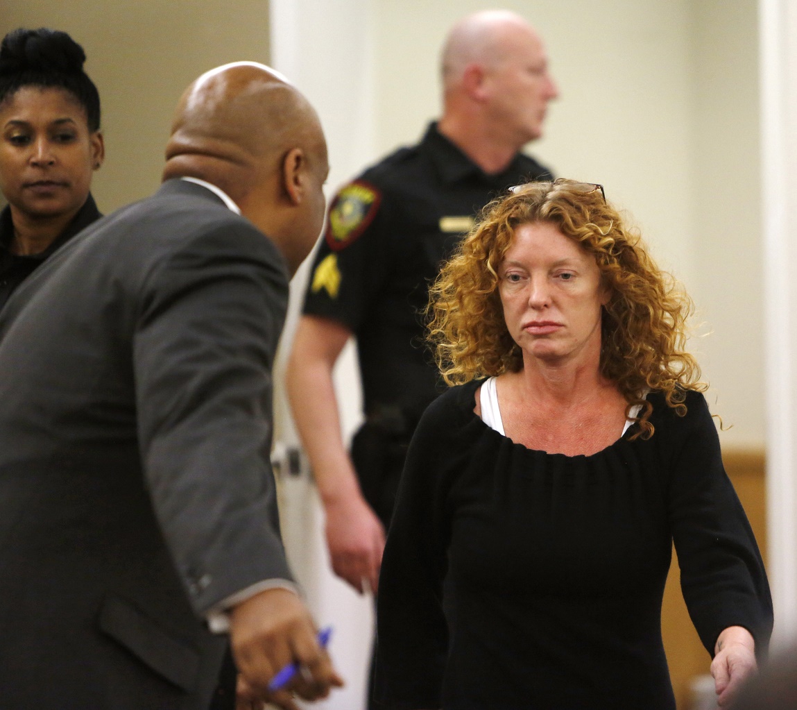 Tonya Couch (R) is escorted to her defense team in Criminal District Court in Fo...