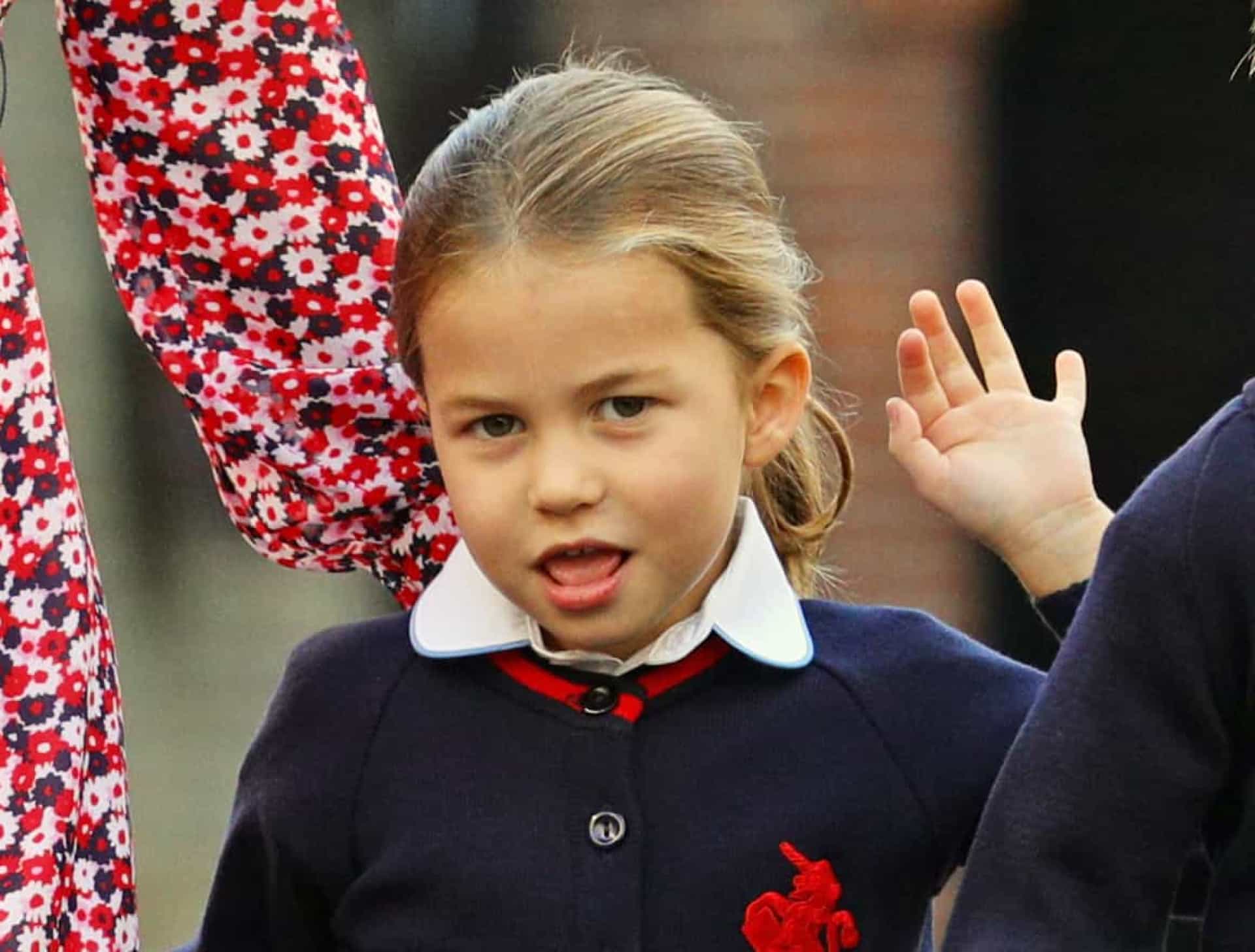 <p>Princess Charlotte waves as she arrives for her first day of school at Thomas's Battersea Prep School in London on September 5, 2019.</p>