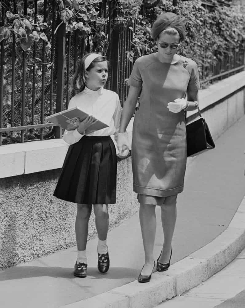 <p>Like any other mom, Princess Grace of Monaco accompanies her daughter Caroline to school in the mid-1960s.  </p>
