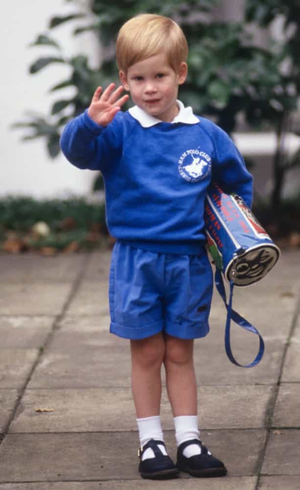 <p>A waving prince Harry greets photographers as he arrives for his first day at Mrs Mynor's Nursery School in Chepstow Villas, Notting Hill, London, on September 16, 1987.</p>