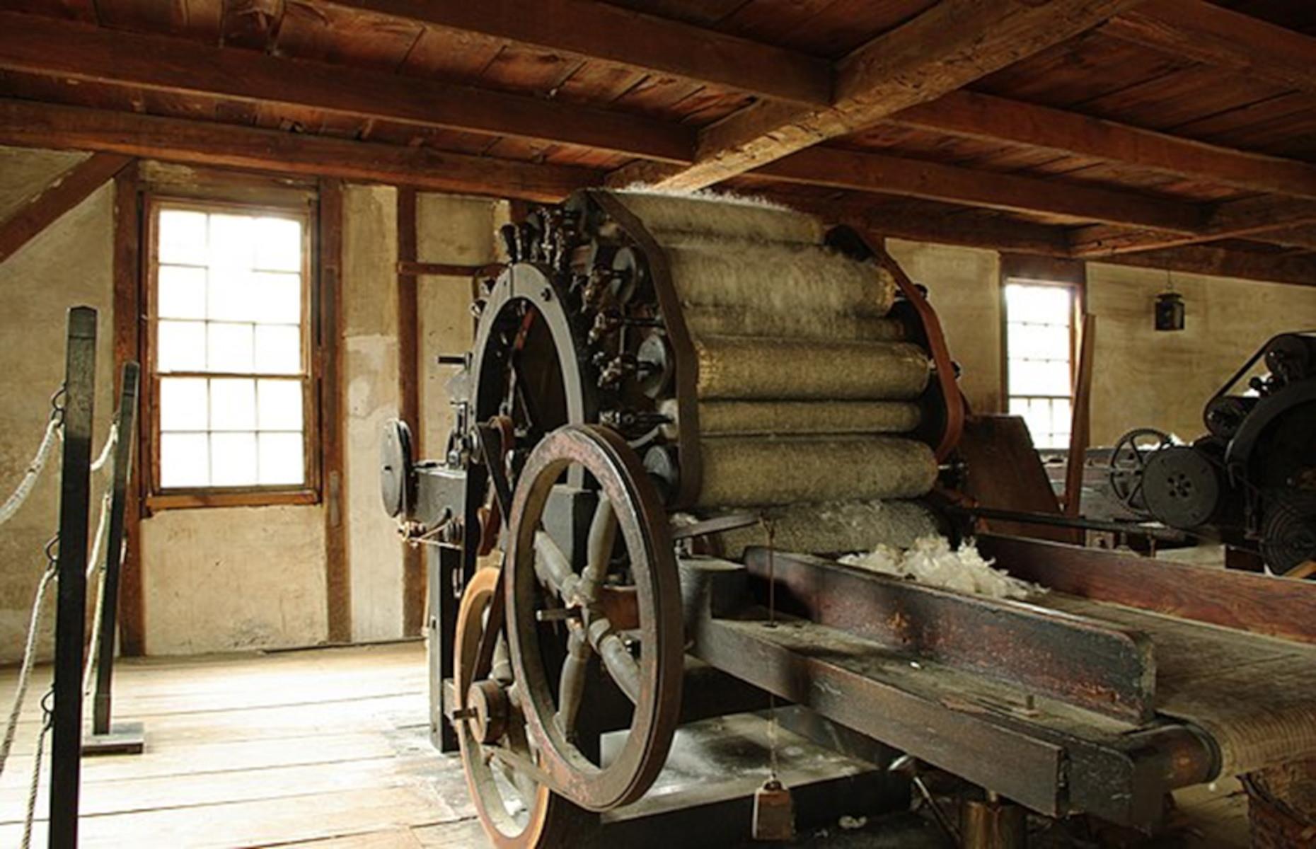 <p>The final sector, the ‘Mill Neighborhood’, features three different, fully operational, water-powered mills: a gristmill, a sawmill, and a carding mill. Of the three mills, the carding mill is the only original structure, with both the building and its machinery dating back to 1840. The three mills are reliant upon the millpond for their energy source, which can be crossed by means of a traditional New England covered bridge imported from Vermont.</p>