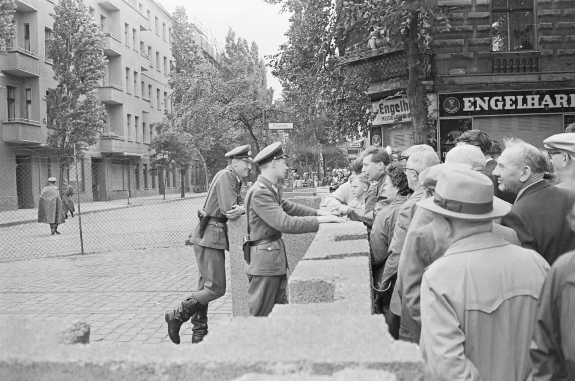 <p>Pictured: conversing across a barricade, members of the East German police force try to explain the situation to a group of West Berliners after the closing of an East-West border point in Berlin.</p><p><a href="https://www.msn.com/en-us/community/channel/vid-7xx8mnucu55yw63we9va2gwr7uihbxwc68fxqp25x6tg4ftibpra?cvid=94631541bc0f4f89bfd59158d696ad7e">Follow us and access great exclusive content everyday</a></p>