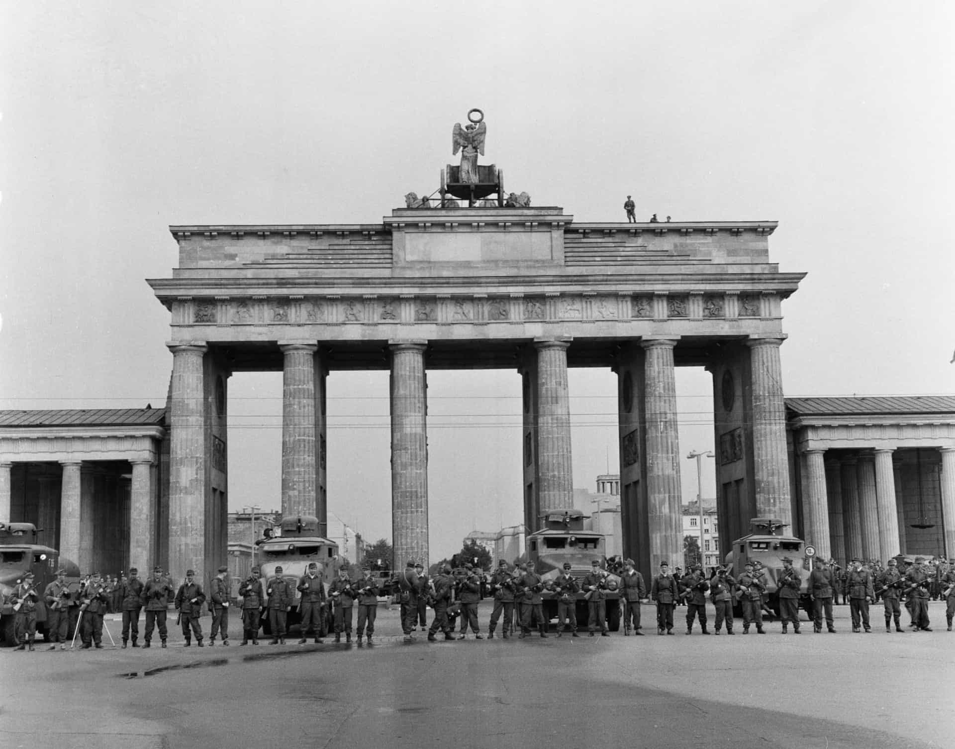 <p>Pictured: members of the Combat Group of the Working Class, deployed to protect the border, stand ready at the Brandenburg Gate, protected by an armored scout vehicle of the border police.</p><p><a href="https://www.msn.com/en-us/community/channel/vid-7xx8mnucu55yw63we9va2gwr7uihbxwc68fxqp25x6tg4ftibpra?cvid=94631541bc0f4f89bfd59158d696ad7e">Follow us and access great exclusive content everyday</a></p>