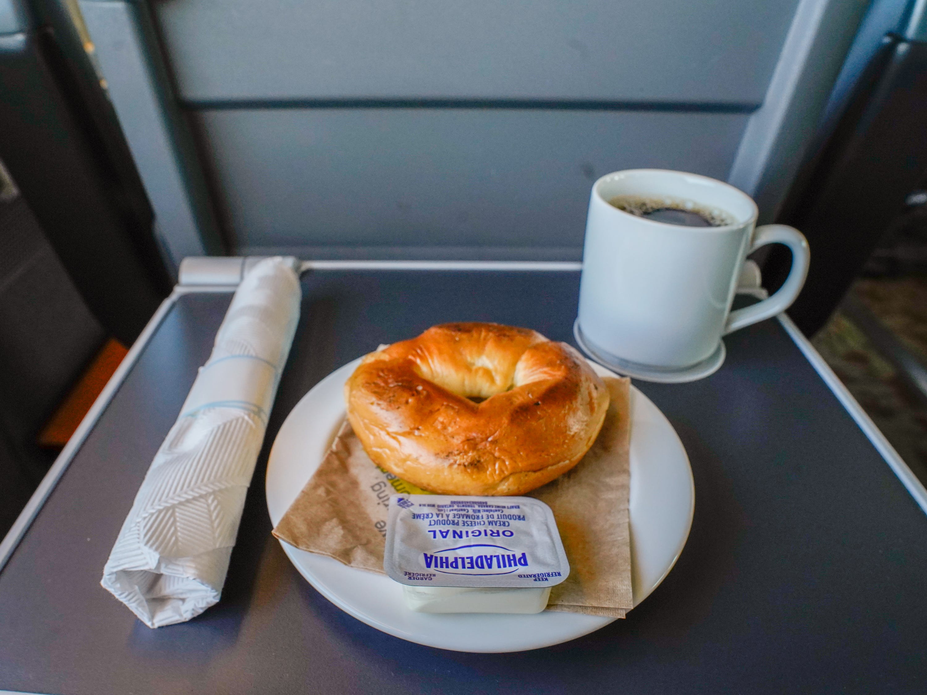 Then it was time for breakfast. Unlike Amtrak's business-class fares, Via Rail's ticket comes with complimentary meals brought to my seat. The train served a warm bagel with cream cheese. It was no New York bagel, I thought, but it was decent and filled me up.
