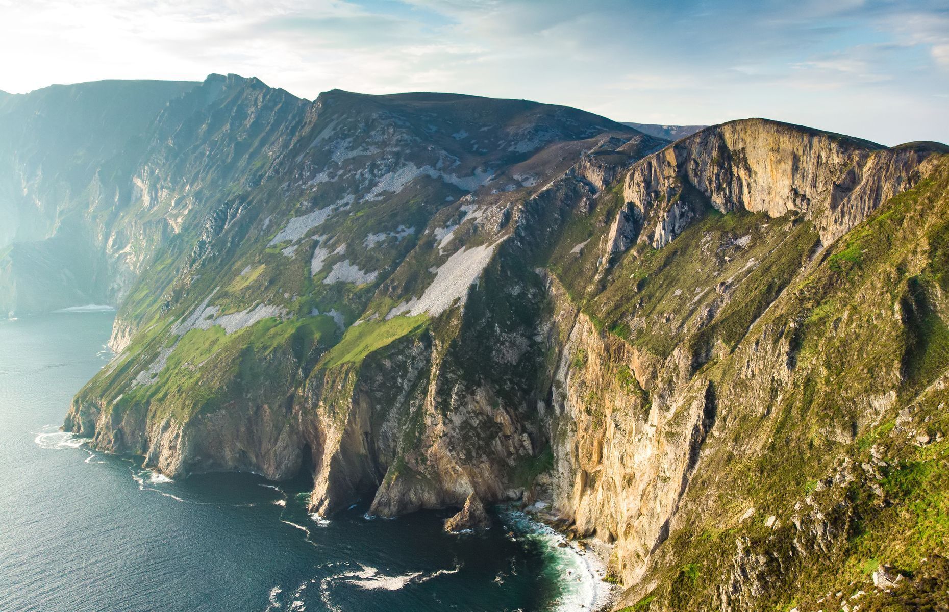 <p>Ranked the second highest in Ireland, the <a href="https://www.ireland.com/en-us/destinations/regions/slieve-league-cliffs/" rel="noreferrer noopener">Slieve</a><a href="https://www.ireland.com/en-us/destinations/regions/slieve-league-cliffs/" rel="noreferrer noopener"> League Cliffs</a> are three times taller than those of Moher. Located in County Donegal, Slieve League is best seen from One Man’s Pass, where you’ll feel like you’re walking in the clouds by the sea side.</p>