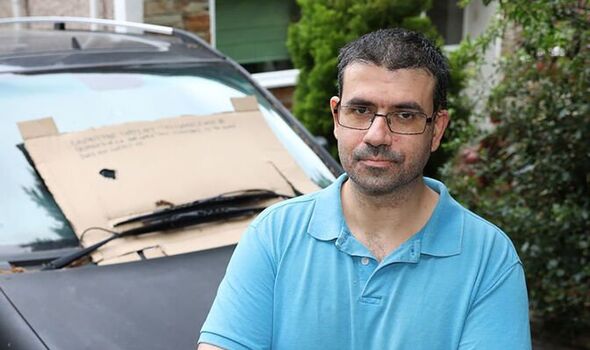 stranger's car removed from man's drive after eight-month battle