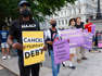 Student loan debt holders take part in a demonstration outside of the White House staff entrance to demand that President Biden cancel student loan debt in August on July 27, 2022 at the Executive Offices in Washington, D.C.