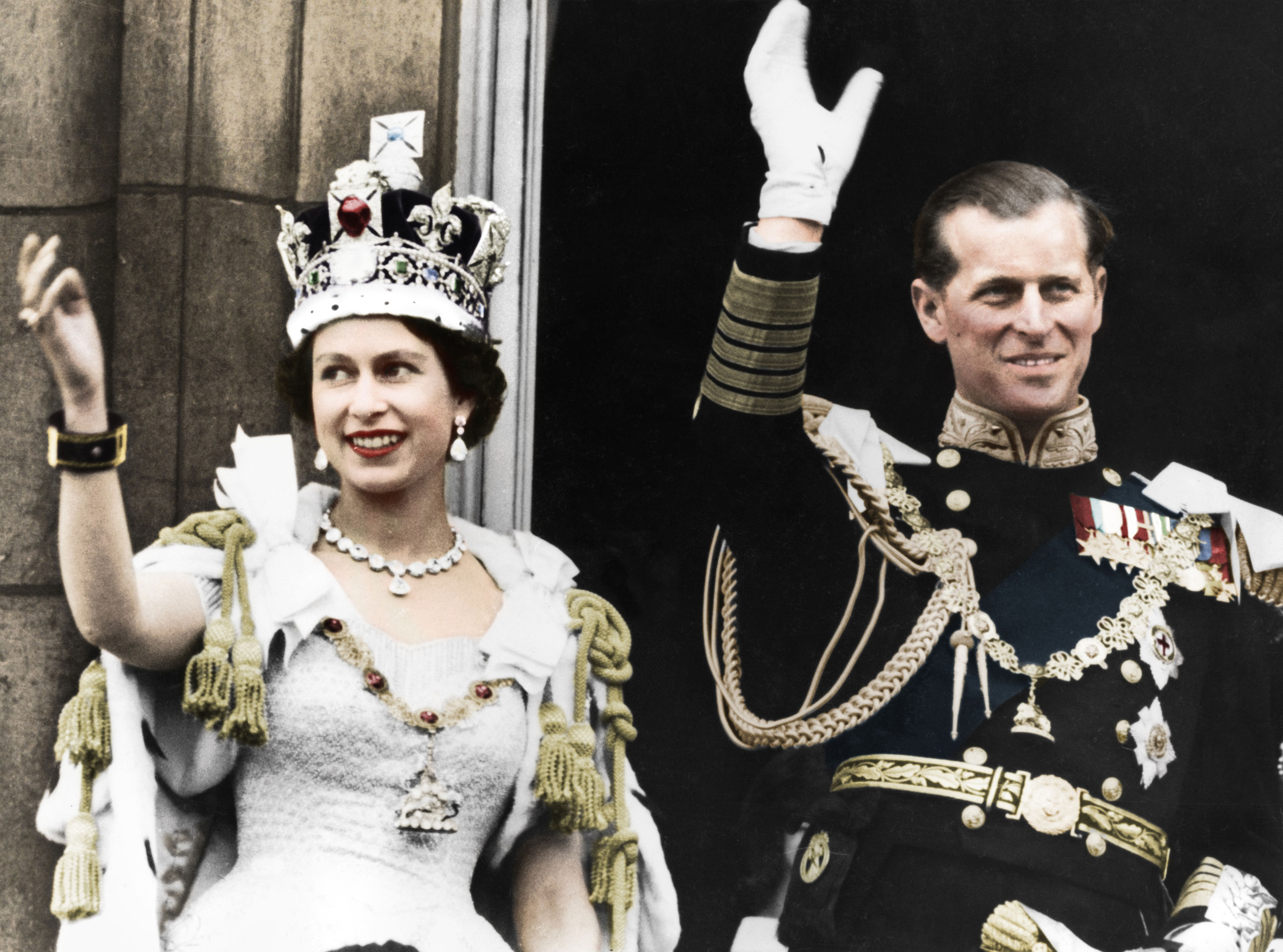 <p>Queen Elizabeth II and husband Prince Philip waved from the balcony of Buckingham Palace on the day of her coronation ceremony -- June 2, 1953.</p>
