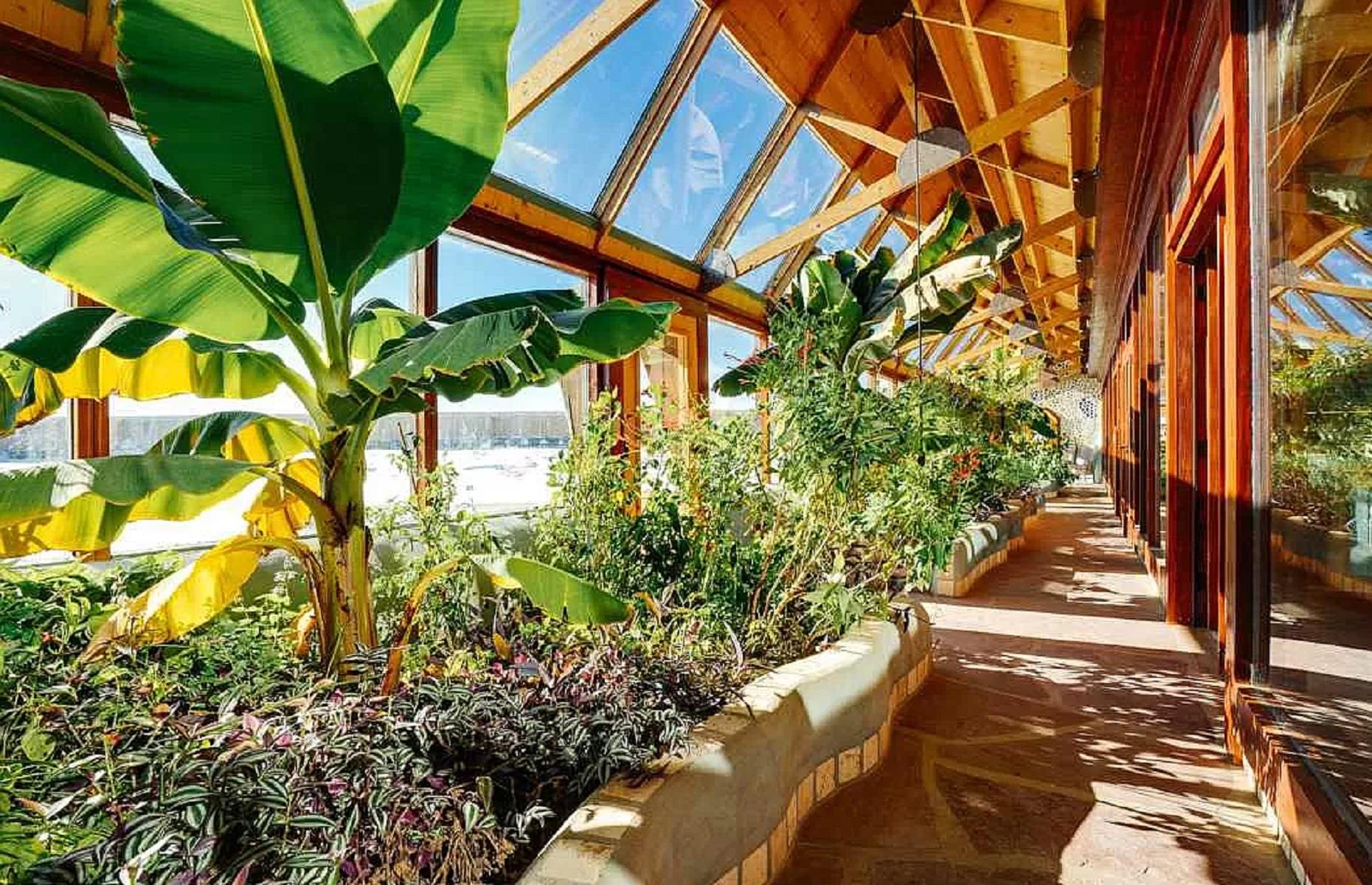 <p>Off-grid living at its finest, the Truchas Earthship was constructed from top-quality materials, inside and out, making it eco-friendly, efficient, and top-of-the-line. Spanning 2,600 square feet, the interior benefits from a huge atrium garden, which runs the length of the building. Filled with mature plants that are fed by the home's gray water system, this indoor oasis was designed for the green-thumbed.</p>