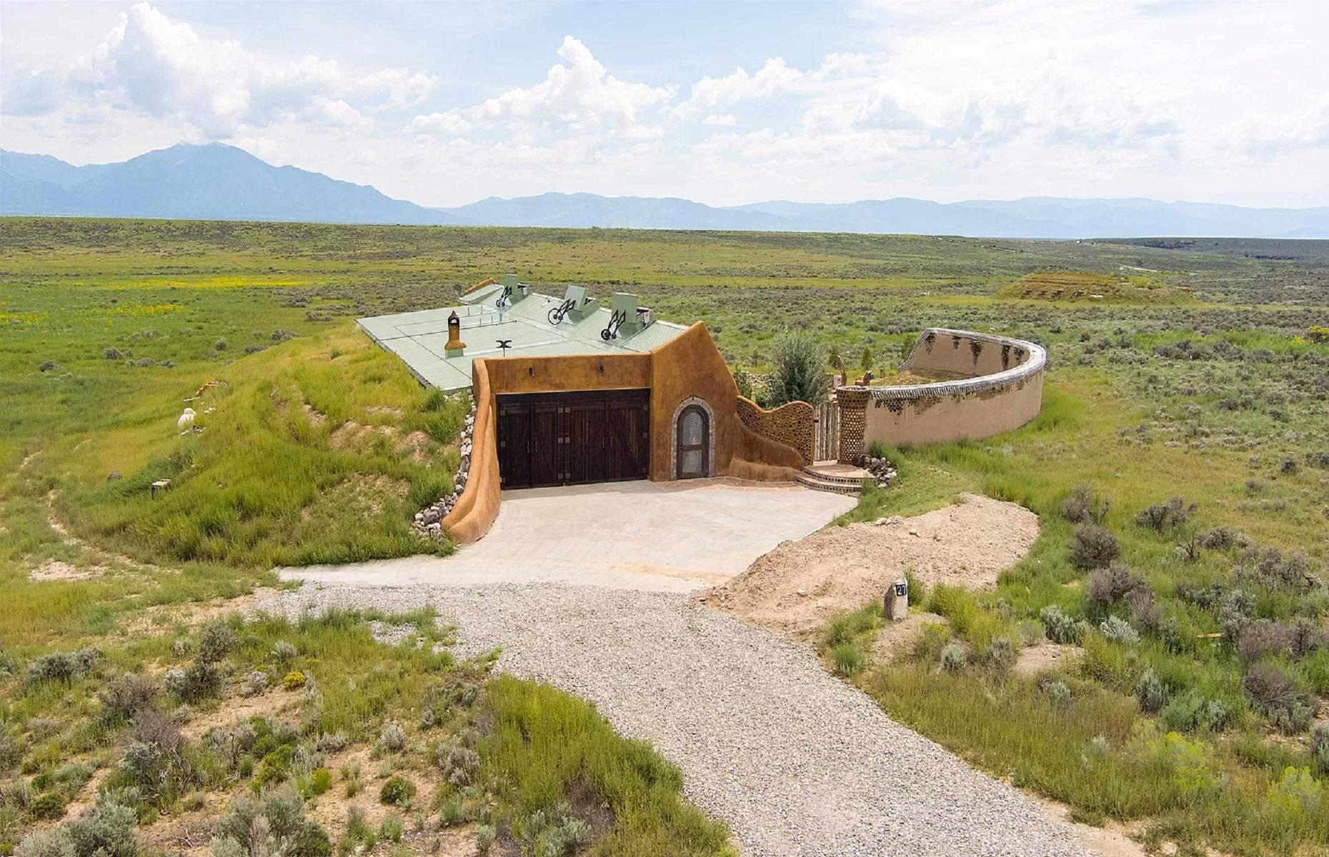 <p>Another option for house-hunters in New Mexico, this stunning Earthship in Tres Piedras is stylish, sleek, and spacious, and it's also a global model that many other Earthships have been based on. It's been featured in magazines like <em>Forbes</em>, and on various TV shows, including Netflix's <em>The World's Most Extraordinary Homes</em>. What's more, it lies inside the Greater World Earthship Community, so you just know you'll be in safe hands. Let's take a closer look...</p>