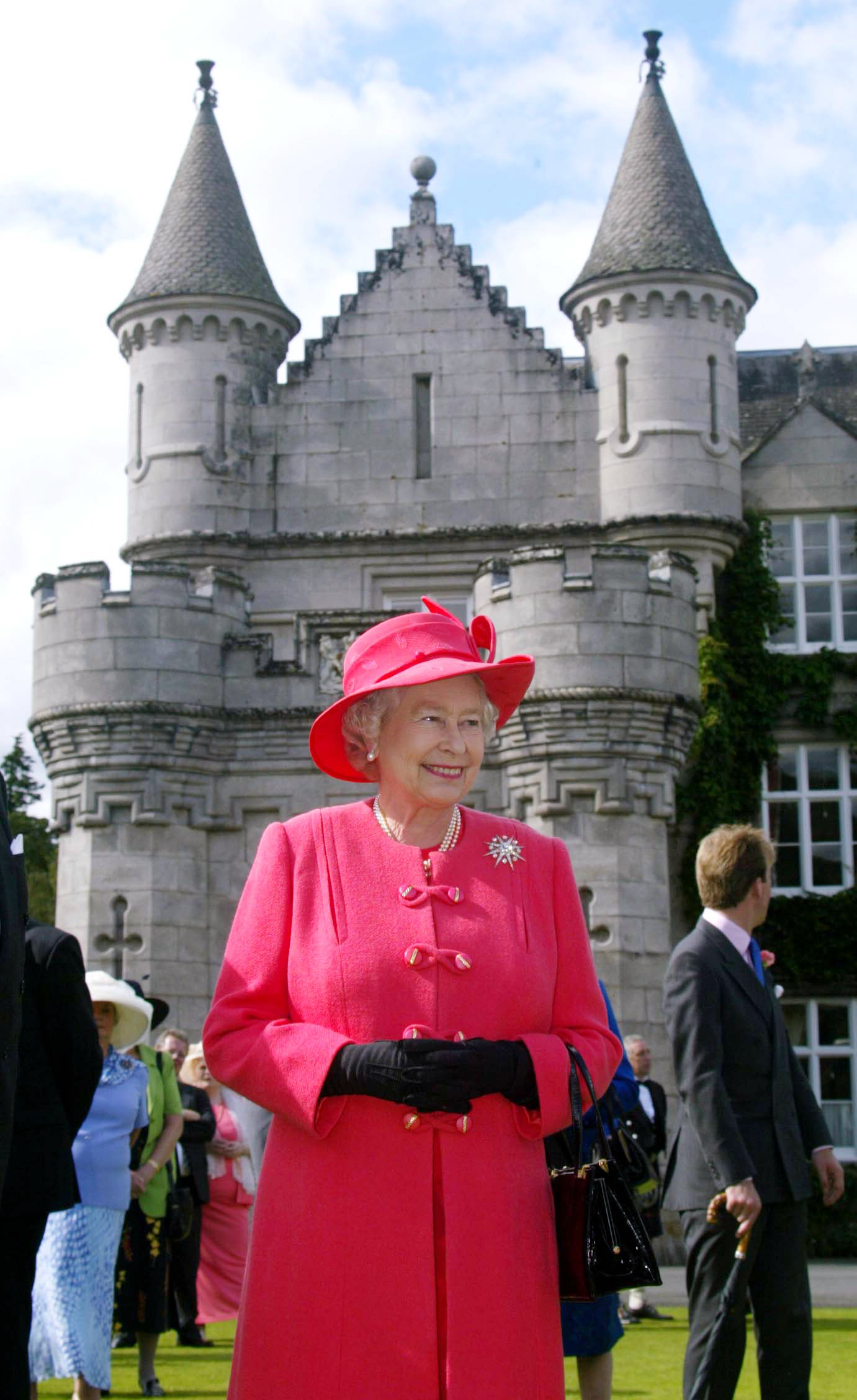 <p>A happy and smiling Queen Elizabeth ll walked across the grounds of her beloved Balmoral Castle -- her private summer home in the Scottish Highlands -- on Aug. 7, 2002, to meet some of the 3,000 guests who were invited to a Garden Party held on the final day of her Golden Jubilee tour celebrating 50 years on the throne. The monarch died there almost exactly 20 years later.</p>