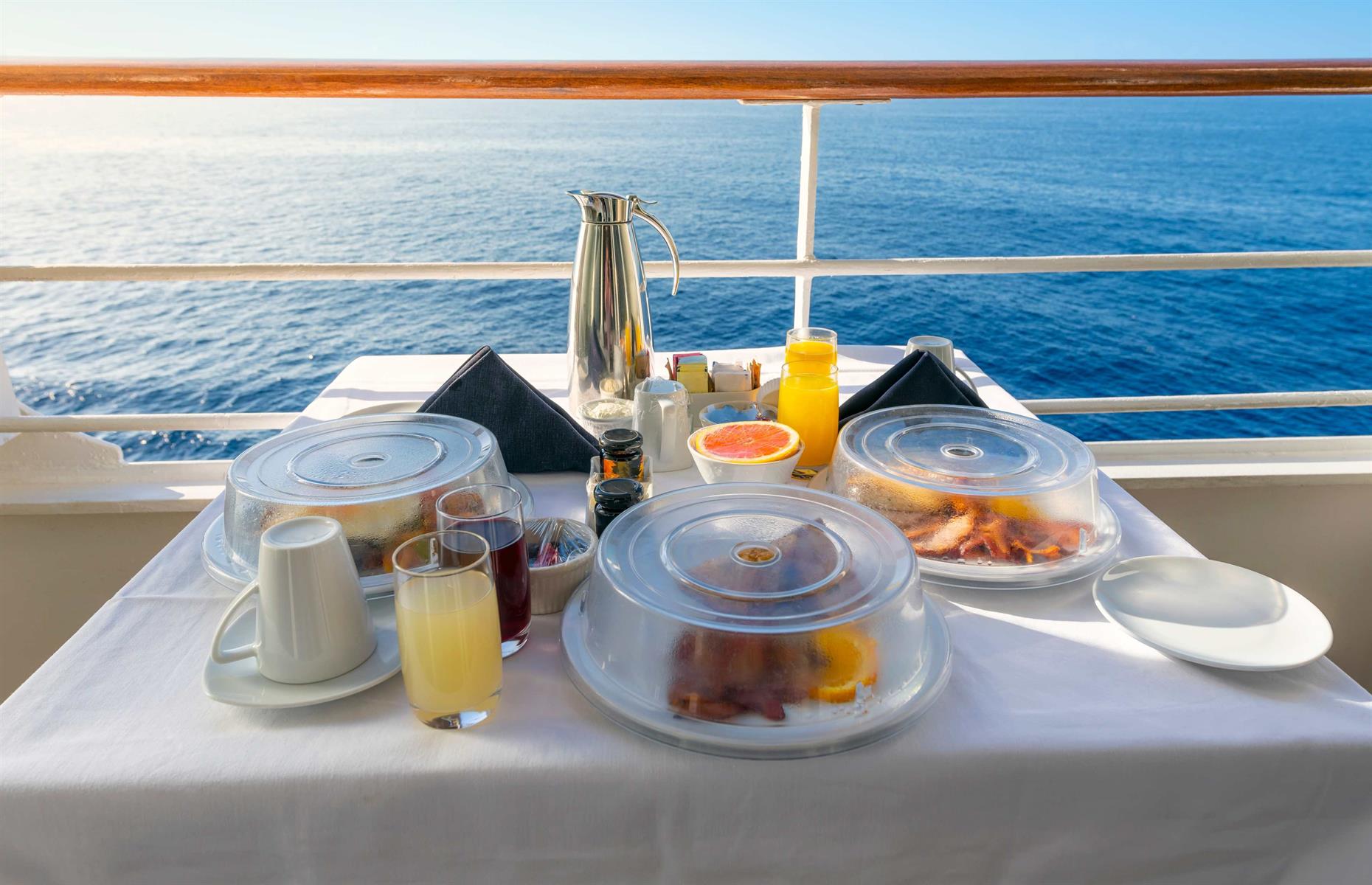 <p>Many cruise lines, such as Princess Cruises and Holland America, offer room service at no extra cost. It’s a win-win situation – you start the day with an in-room feast and the cruise line reduces overcrowding in its most popular restaurants. Windstar Cruises is just one example of a line that goes above and beyond for in-cabin dining. There are no extra charges, the service is available 24 hours a day and the menu from flagship restaurant Amphora can be ordered during dinner hours.</p>