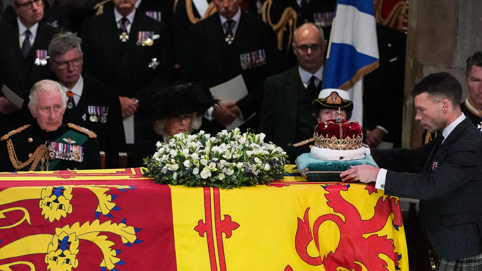 <p>Britain's King Charles III, Camilla, Queen Consort and Princess Anne, Princess Royal watched as the Duke of Hamilton, Alexander Douglas-Hamilton, placed the Crown of Scotland atop the coffin of Queen Elizabeth II inside St. Giles Cathedral in Edinburgh, Scotland, on Sept. 12, 2022, during a Service of Thanksgiving honoring her life a week before her funeral was to be held in London. </p>