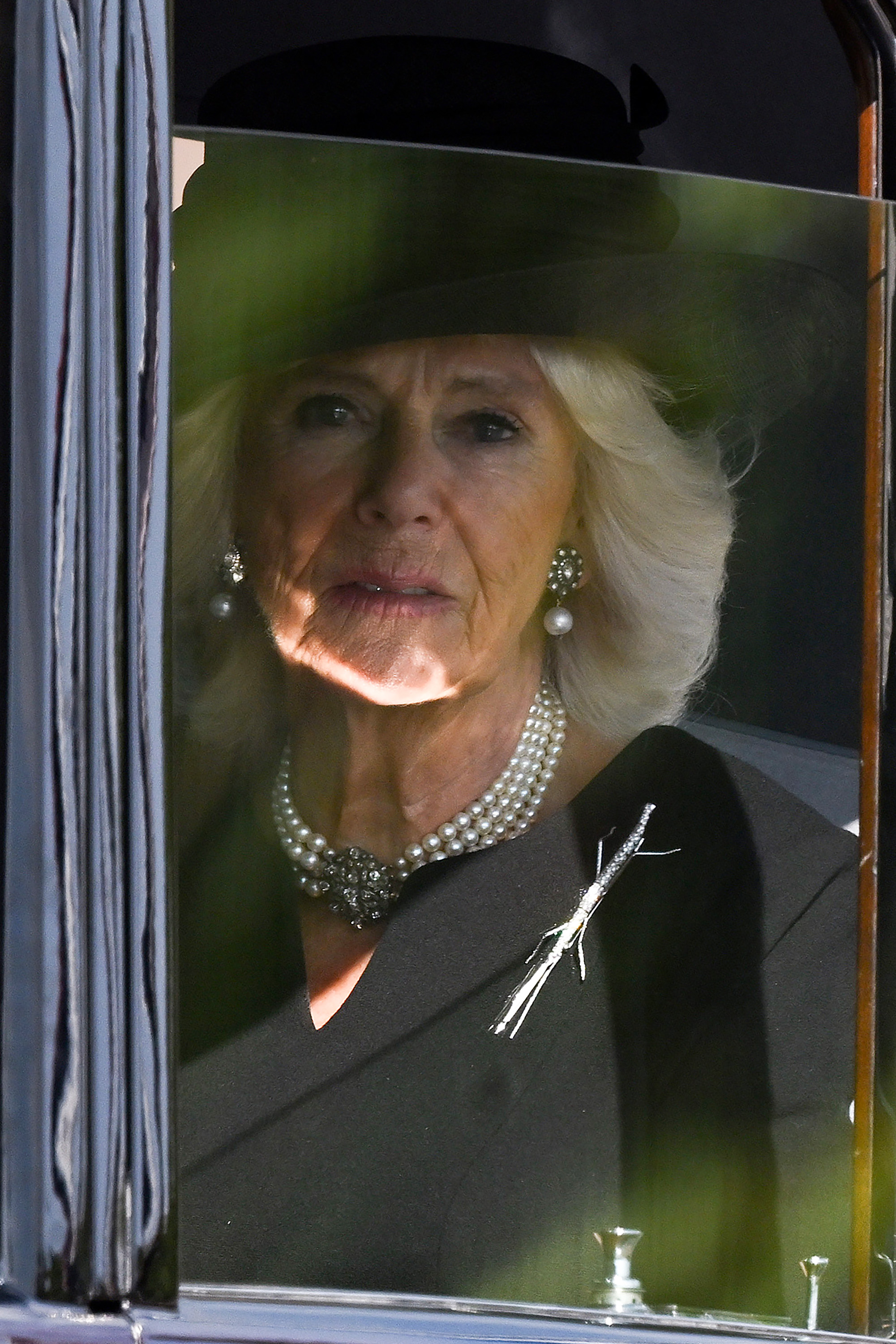 <p>Camilla, Queen Consort departed Buckingham Palace to follow as the coffin of Queen Elizabeth II, adorned with a royal standard and the Imperial State Crown, was pulled by a gun carriage of the King's Troop Royal Horse Artillery during a procession to Westminster Hall on Sept. 14, 2022, for the late monarch's lying in state.</p>