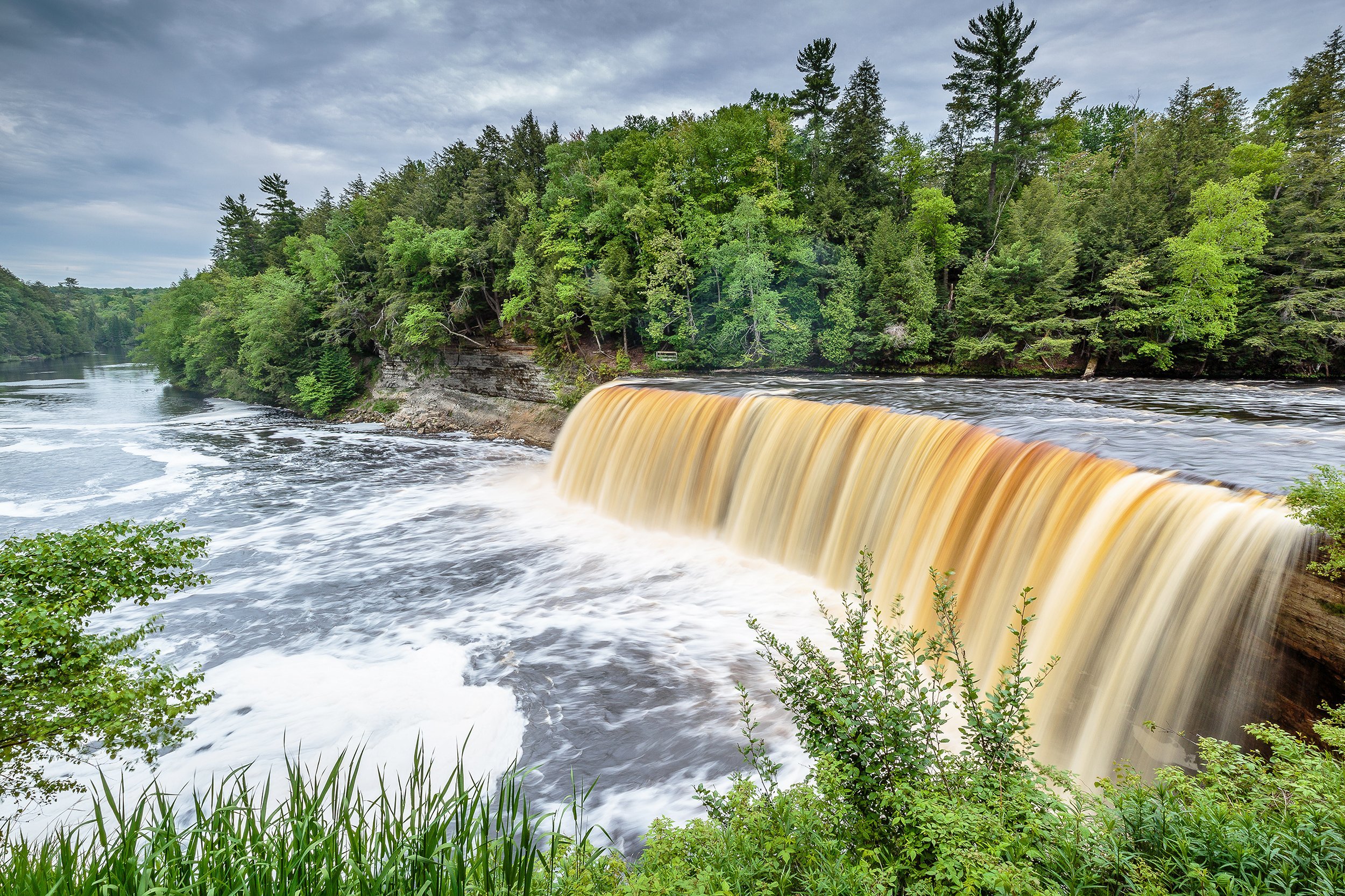 <p><a href="https://www2.dnr.state.mi.us/ParksandTrails/Details.aspx?id=428&type=SPRK">Tahquamenon Falls State Park</a> is home to one of the largest waterfalls east of the Mississippi. The Upper Falls feature a drop of nearly 50 feet, and that's just one reason to make a weekend visit this fall. The tannins from the cedar, spruce and hemlock in the river makes the water a striking copper color that pairs beautifully with the autumn colors of northern Michigan. Campers have a choice of several campgrounds within the park for RV visits.</p> <p><b>Related:</b> <a href="https://blog.cheapism.com/best-waterfalls-in-u-s-3781/">Beyond Niagara: Where to Find Waterfalls in All 50 States</a> </p>