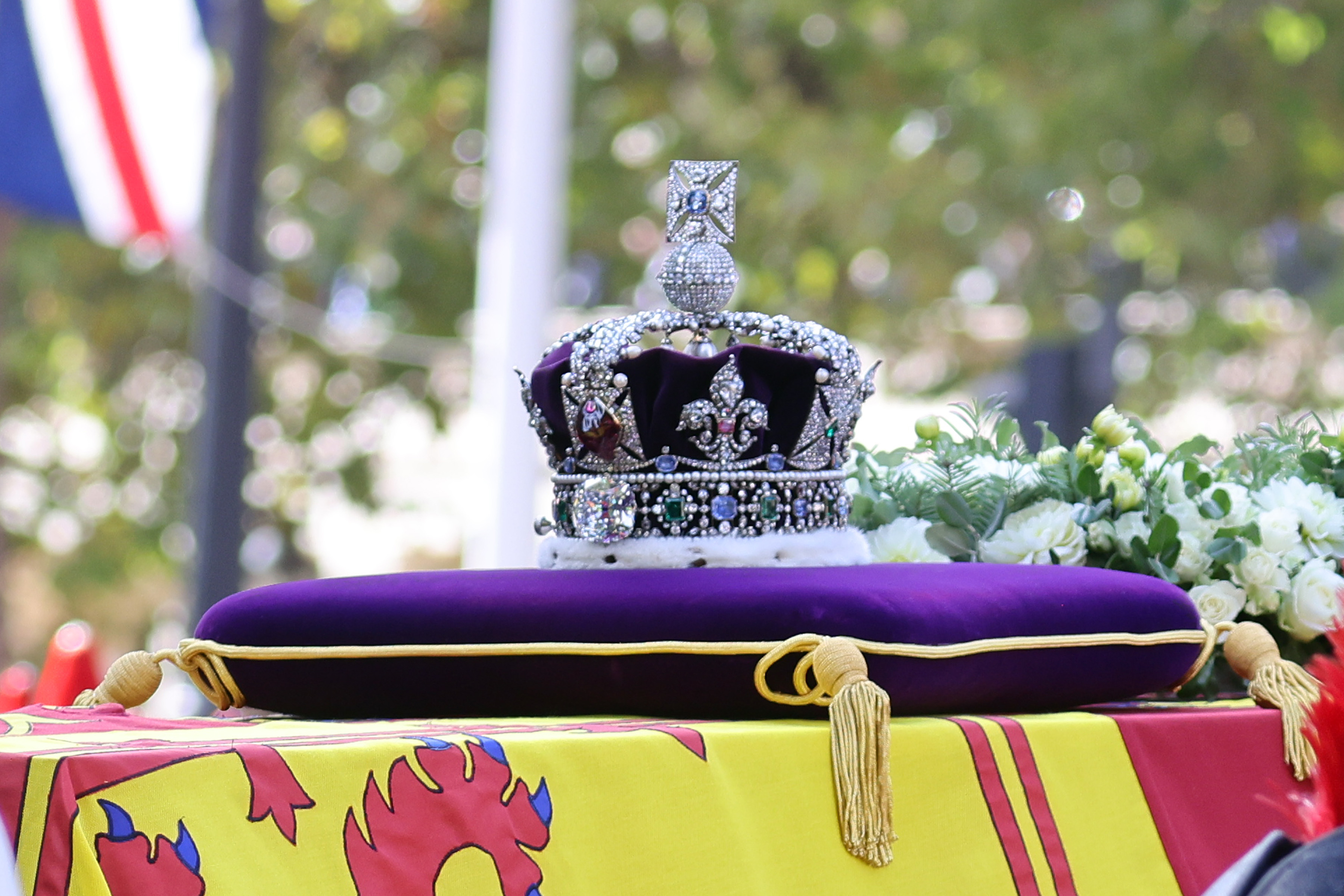 <p>The Imperial State Crown sat on a velvet cushion atop Queen Elizabeth II's coffin as it traveled from Buckingham Palace to Westminster Hall in London on Sept. 14, 2022, for her lying-in-state. The crown was made for the coronation of her father, King George VI in 1937, and then worn by Elizabeth at her own coronation in 1953.</p>