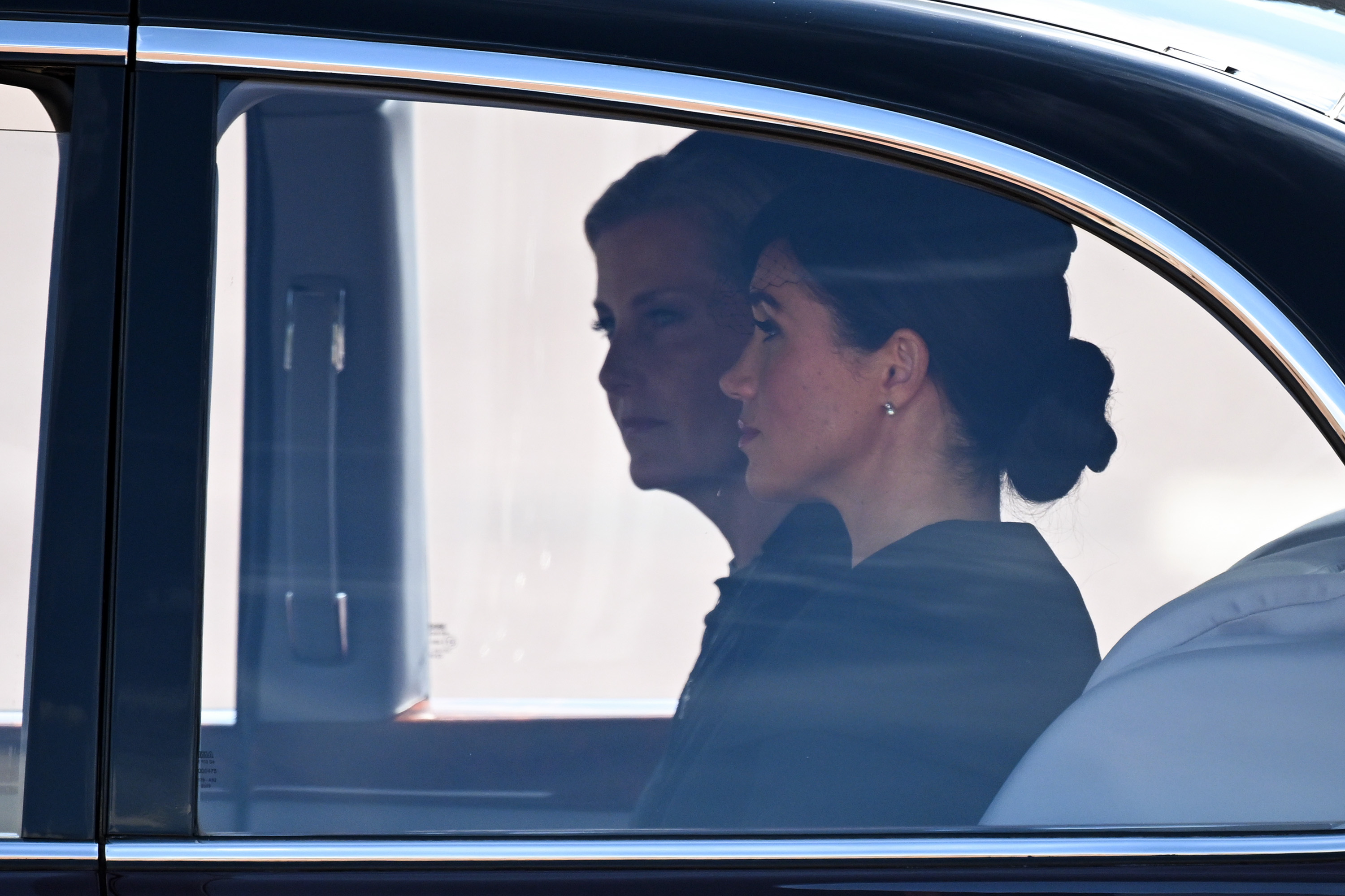 <p>Sophie, Countess of Wessex and Meghan, Duchess of Sussex were driven in a car following the coffin of Queen Elizabeth II during during the procession from Buckingham Palace to Westminster Hall in London for her lying-in state on Sept. 14, 2022.</p>