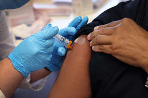 Getting vaccinated on Sept. 9, 2022, in Chicago.