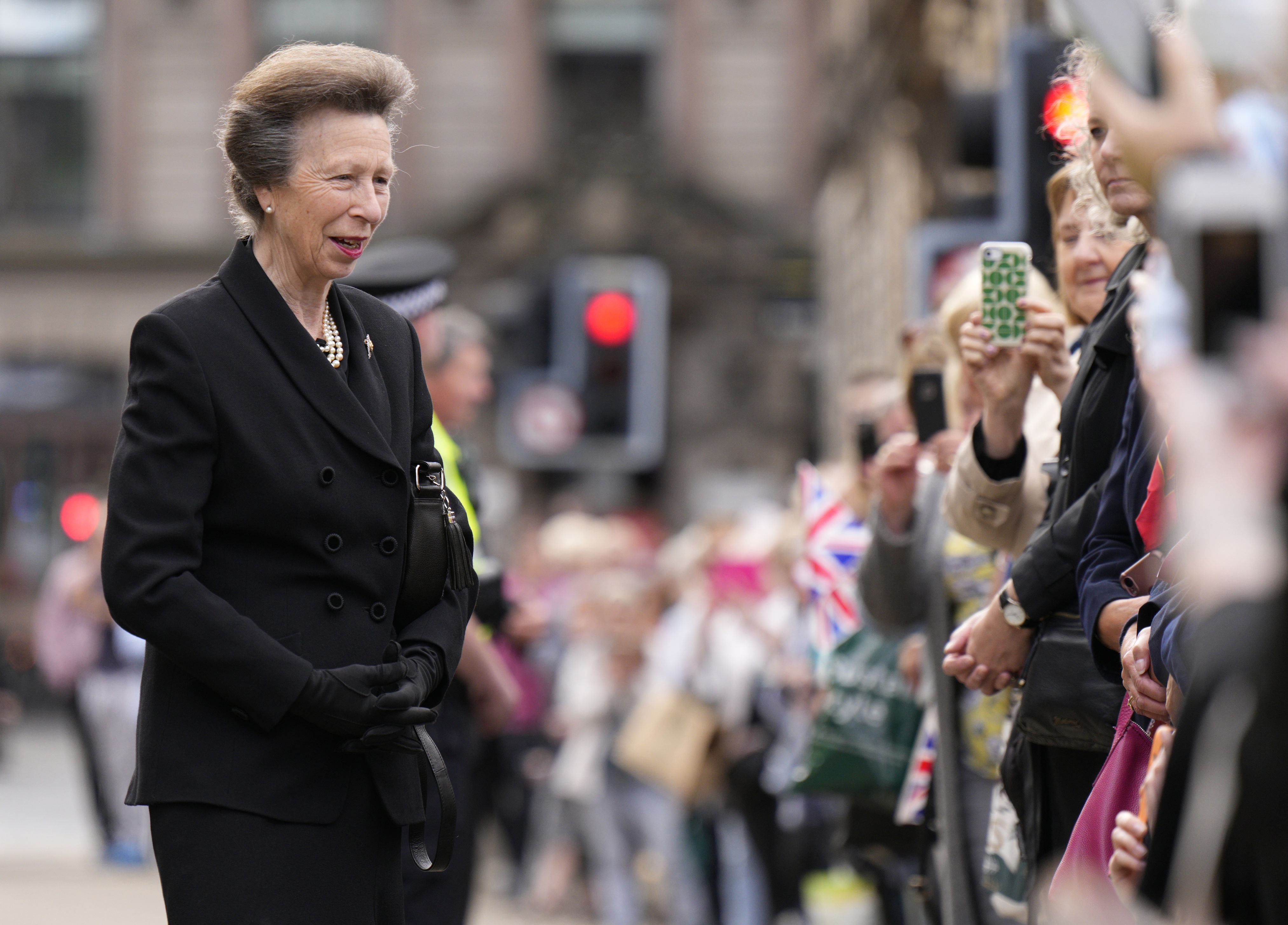 <p>Princess Anne greeted members of the public and viewed tributes laid outside City Chambers in Glasgow, Scotland, on Sept. 15, 2022, after meeting representatives of organizations of which her late mother, Queen Elizabeth II, was patron, in the run-up to the monarch's funeral. She and other senior royals stepped in to support her brother King Charles III as he retreated to his Highgrove estate to spend a day in quiet reflection after a packed schedule of events following their mother's death on Sept. 8.</p>