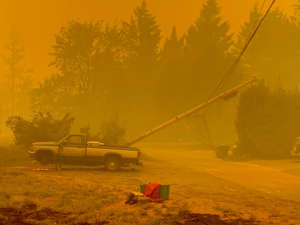 A downed power line is seen in the Mill City area that was burned during the wildfires that impacted the Santiam Canyon over Labor Day 2020.