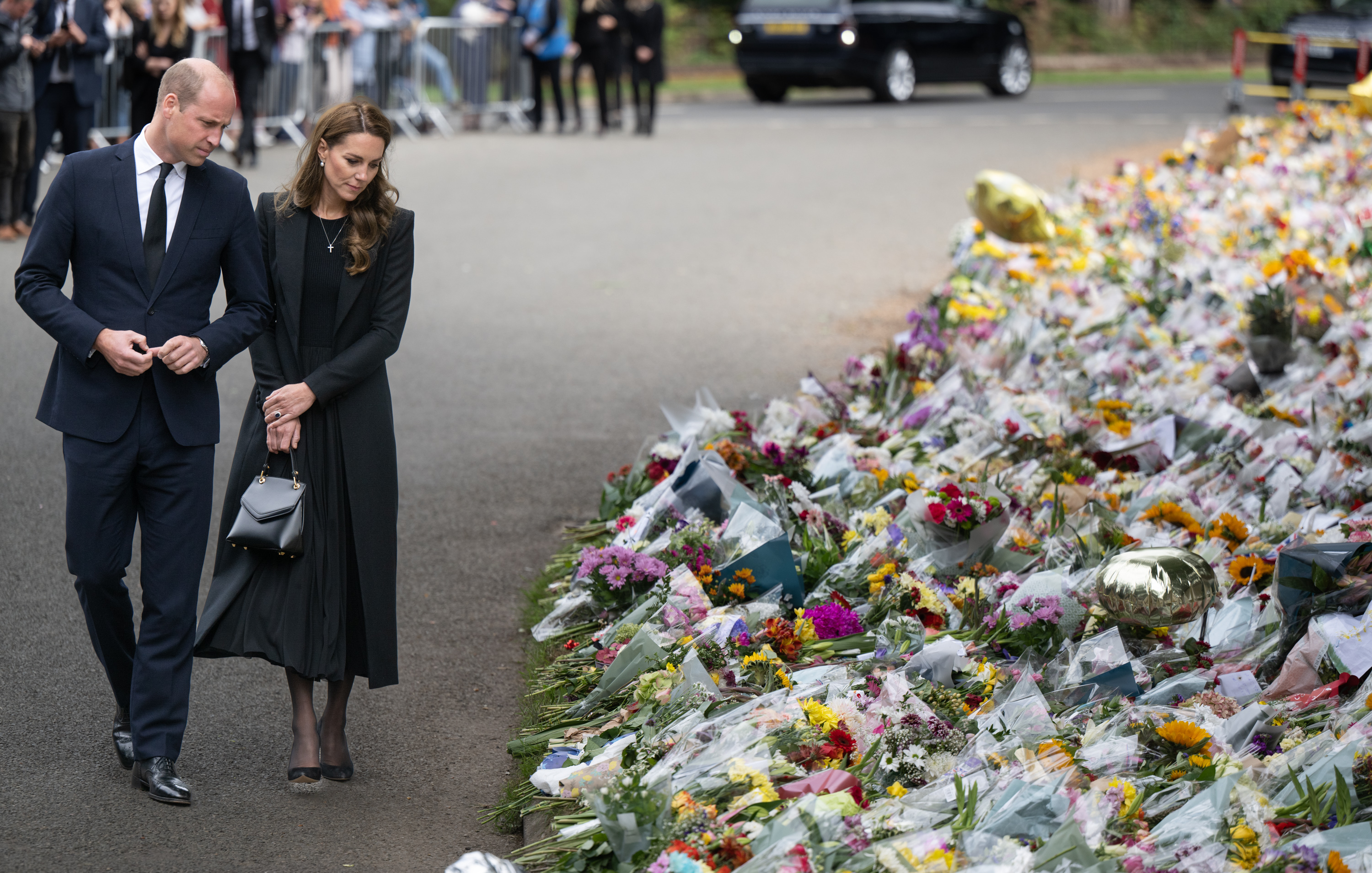 <p><a href="https://www.wonderwall.com/celebrity/profiles/overview/prince-william-482.article">Prince William</a> and Princess Kate viewed floral tributes left at the Norwich Gates outside Queen Elizabeth II's Sandringham estate in King's Lynn, England -- where the royal family traditionally spent their Christmases when the monarch was alive -- on Sept. 15, 2022, in the lead-up to Her Majesty's funeral.</p>