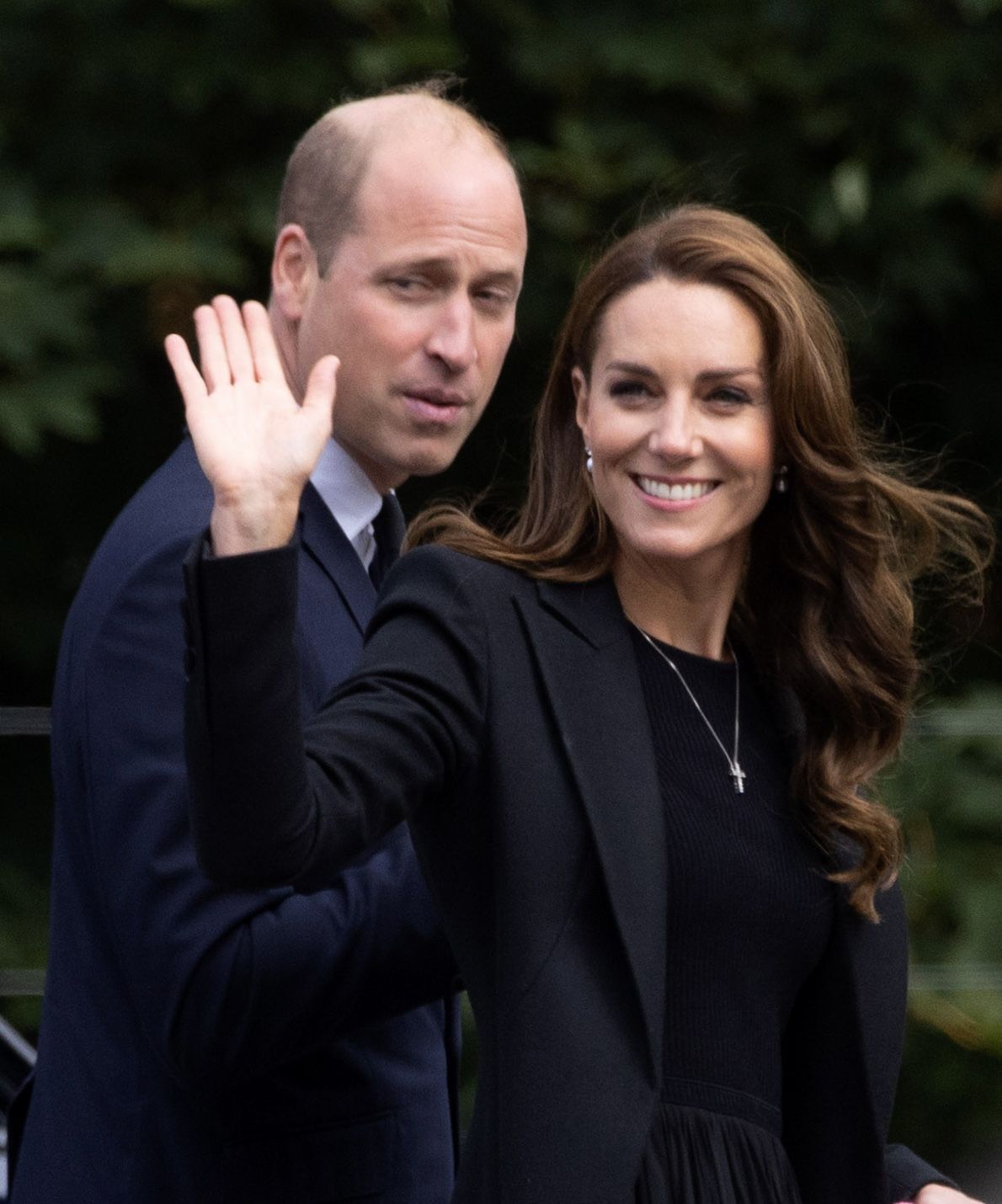 <p><a href="https://www.wonderwall.com/celebrity/profiles/overview/prince-william-482.article">Prince William</a> and Princess Kate -- wearing a pair of pearl earrings that belonged to Queen Elizabeth II -- waved to the crowds as they viewed floral tributes left at the Norwich Gates outside his grandmother's Sandringham estate in England's Norfolk region, where the royal family traditionally spent their Christmases when the queen was alive, on Sept. 15, 2022, in the lead-up to Her Majesty's funeral. They and other senior royals stepped in to support William's father, King Charles III, as he retreated to his Highgrove estate to spend a day in quiet reflection after a packed schedule of events following the queen's death on Sept. 8.</p>