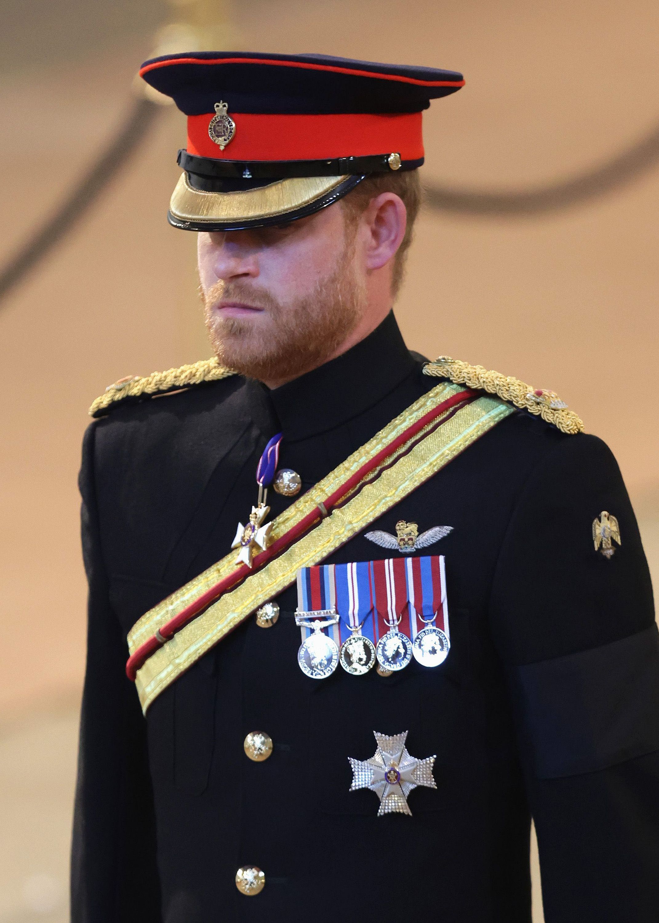 <p><a href="https://www.wonderwall.com/celebrity/profiles/overview/prince-harry-481.article">Prince Harry</a>, Duke of Sussex held vigil to honor grandmother Queen Elizabeth II, with his cousins, at Westminster Hall at the Palace of Westminster in London on Sept. 17, 2022, during the late monarch's lying-in-state ahead of her Sept. 19 funeral. King Charles III permitted Harry, a British army veteran, to wear his uniform despite no longer being a working royal. </p>